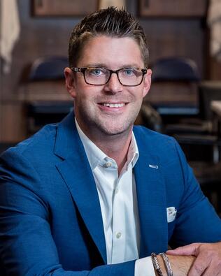 Headshot of Adam Clemens