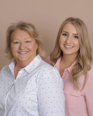 Headshot of Hannah and Denise