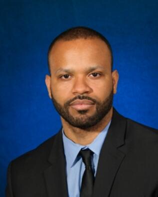 Headshot of Mike Maignan