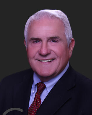 Headshot of Dean Gilbert