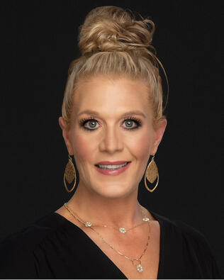 Headshot of Ashlee Erickson-Trainer