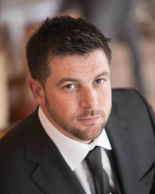 Headshot of Joel Aratare