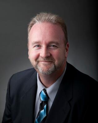 Headshot of Brian Rowland