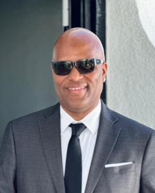 Headshot of Delroy Burnett