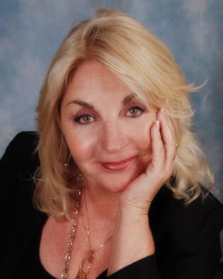 Headshot of Vicky Beggins