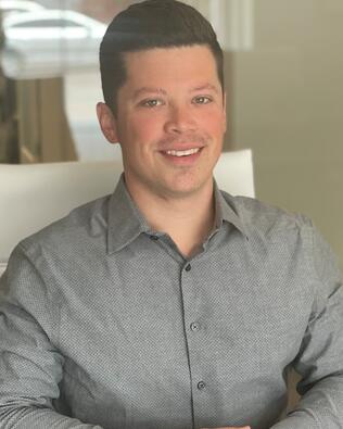 Headshot of Jake Hughes