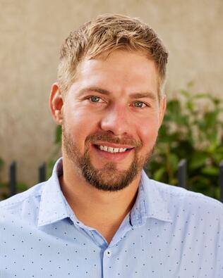 Headshot of Adam Keen