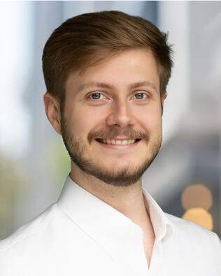 Headshot of Nate Vogel