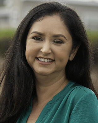 Headshot of Sira Taylor