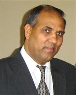 Headshot of Surinder Bains