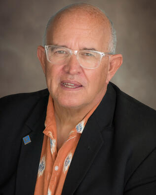 Headshot of John "Mickey" Ramos