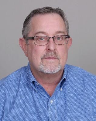 Headshot of Michael Aikins