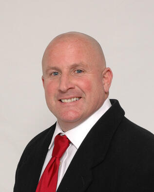 Headshot of Kirk Del Russo