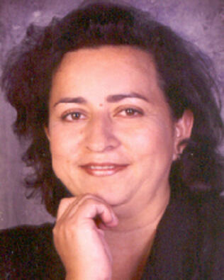 Headshot of Gloria Alvarez