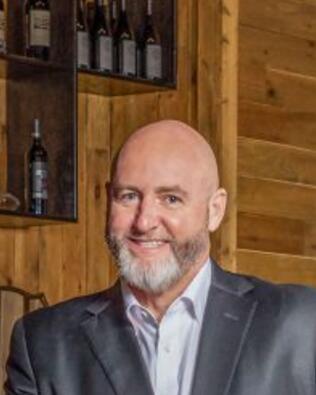 Headshot of Jason Pesola