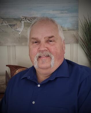 Headshot of Christopher Devens