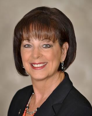 Headshot of Sharon Adcock