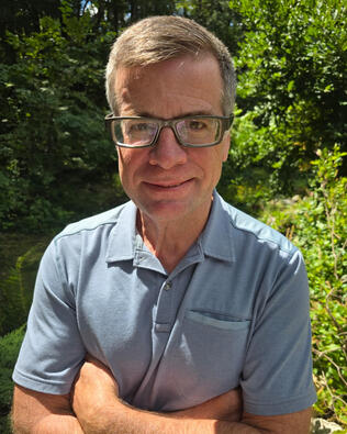 Headshot of James DELANEY
