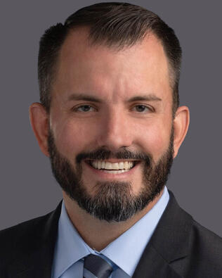 Headshot of Daniel E. Weaver