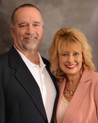 Headshot of Sandy and Michael Bryan