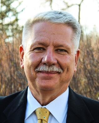 Headshot of Dennis Molitor
