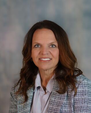 Headshot of Tracy Doster