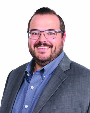 Headshot of Adam Fisher