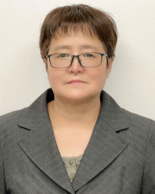 Headshot of Yuhua Zhang