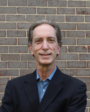 Headshot of Gary Kusher