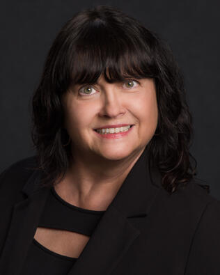 Headshot of Susan Daniels REALTOR®