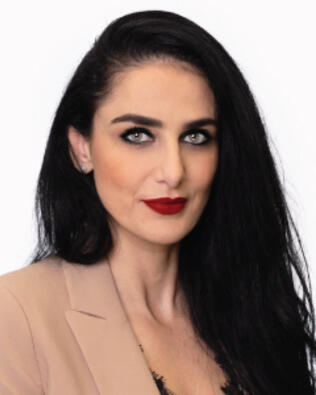 Headshot of Amal Allan