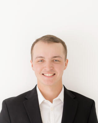 Headshot of Christian Greaves