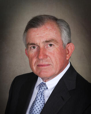 Headshot of Roger Austin
