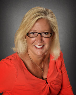 Headshot of Kristi Matthew