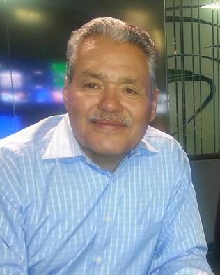 Headshot of Mickey Molina