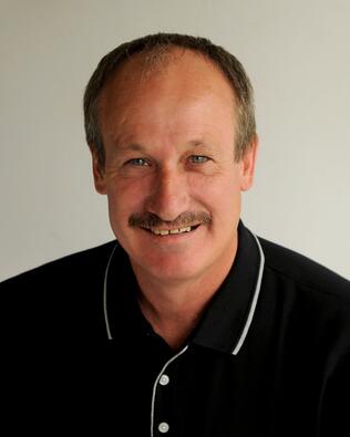 Headshot of Alan Wilkins