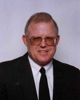 Headshot of Dennis LaClair