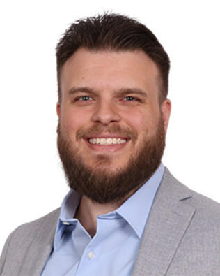 Headshot of Thomas Carlson