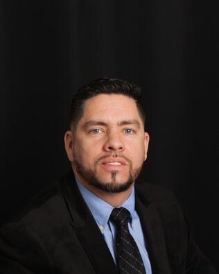 Headshot of EMMANUEL FELICIANO