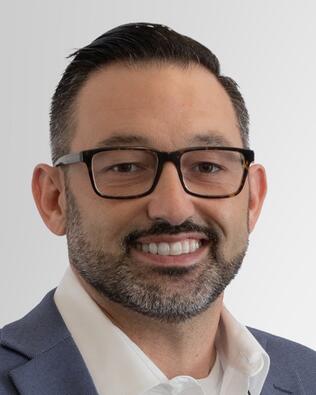 Headshot of Jason Deneen