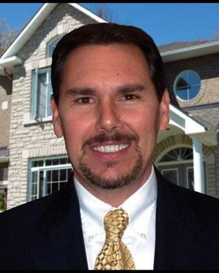 Headshot of John Ryan