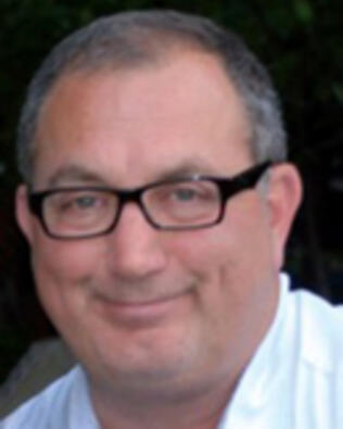 Headshot of Kourosh Nosrati