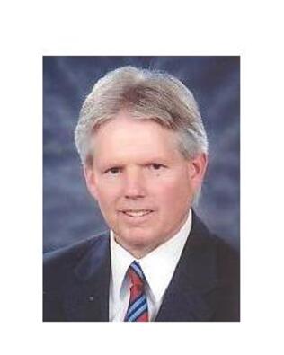 Headshot of Clarke Ashton