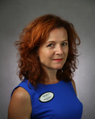 Headshot of Manuela Davis