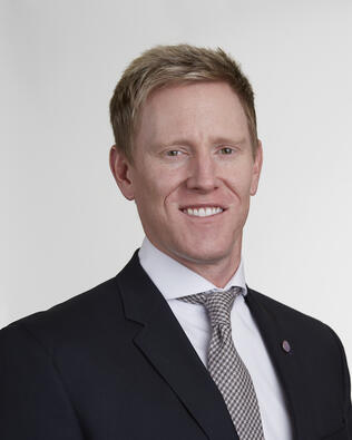 Headshot of Justin Nelson