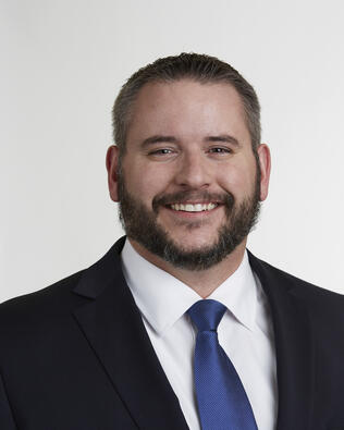 Headshot of Andrew Schoenfeld