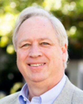 Headshot of Dixon Wilcox