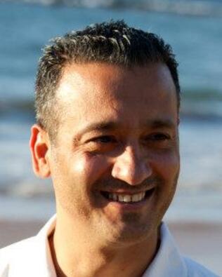 Headshot of Hamid R. Khoshain
