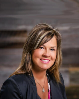 Headshot of Trina Einterz Roth