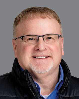 Headshot of Dan Ness